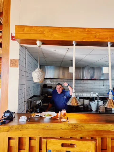 Chef Jose Lopez behind the open kitchen counter