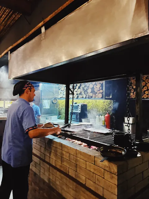 Chef Jose Lopez working in an open kitchen