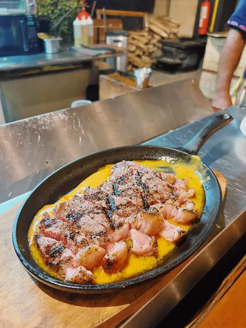 A sizzling dish cooked over live fire in Costa Rica