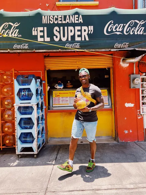Chef Tayo enjoying a fresh coconut in Mexico City