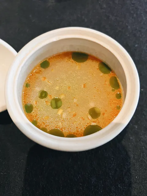 A warm broth course at Pujol