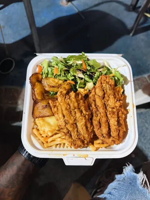 Fried fish with plantains and salad