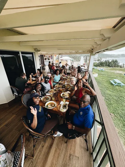 Group lunch overlooking the Barbados coast