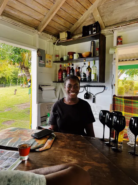 Smiling bartender in St. Kitts and Nevis